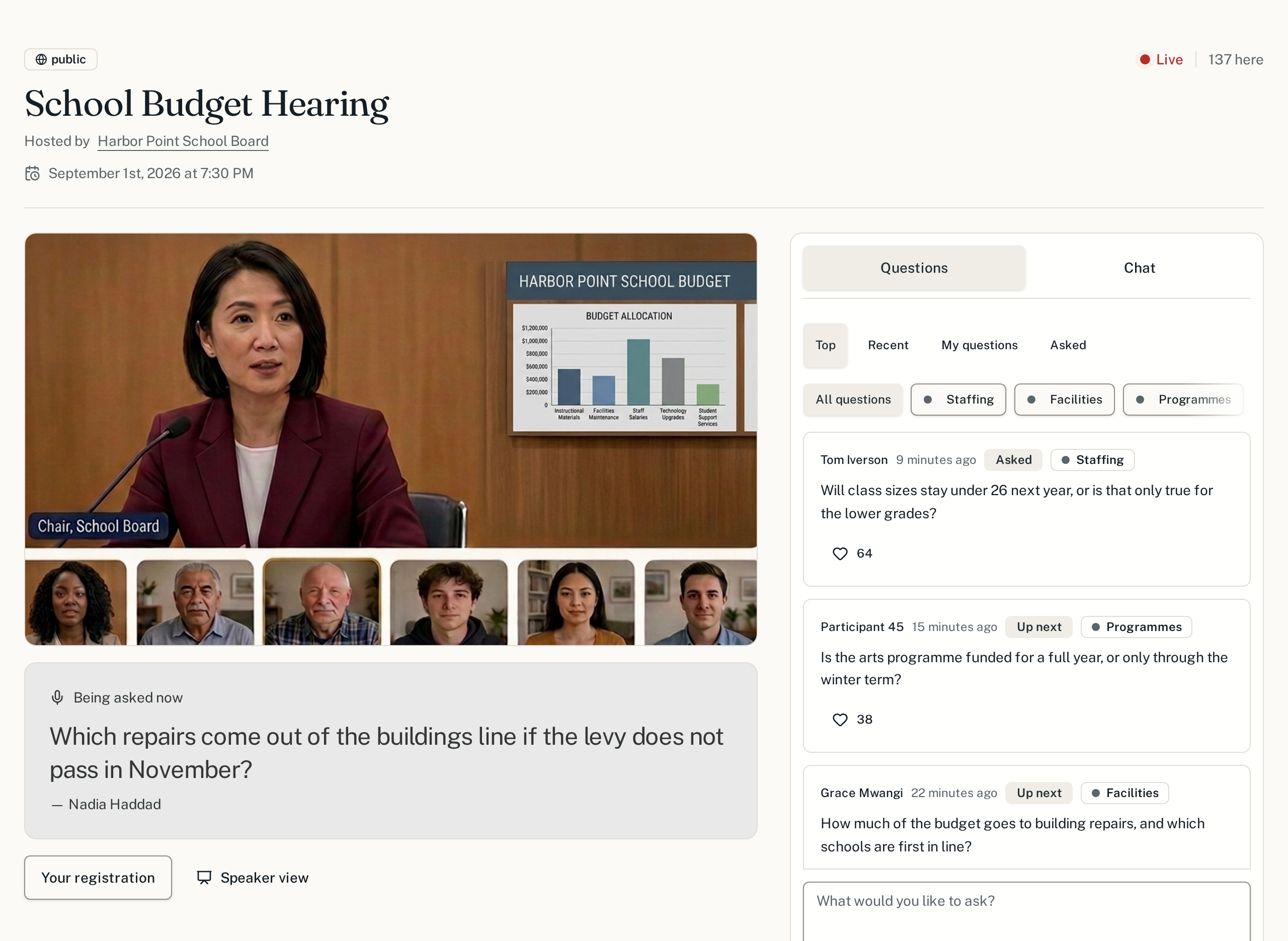 The participant view during a live school budget hearing: the video call on the left with the question being asked in the light gray panel beneath it, and the questions column on the right showing the Asked filter.